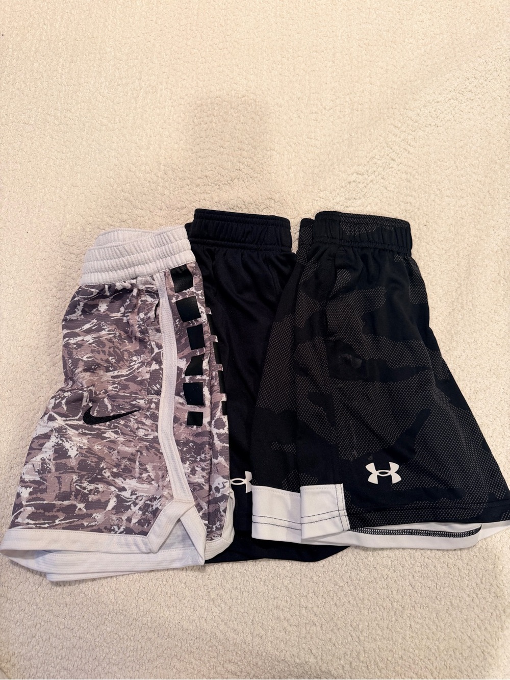 3 size X Small Shorts:  Nike and Under Armour